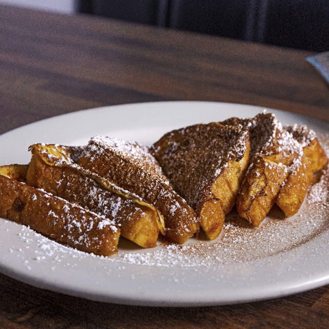 2 Eggs w/Pancakes or French Toast.